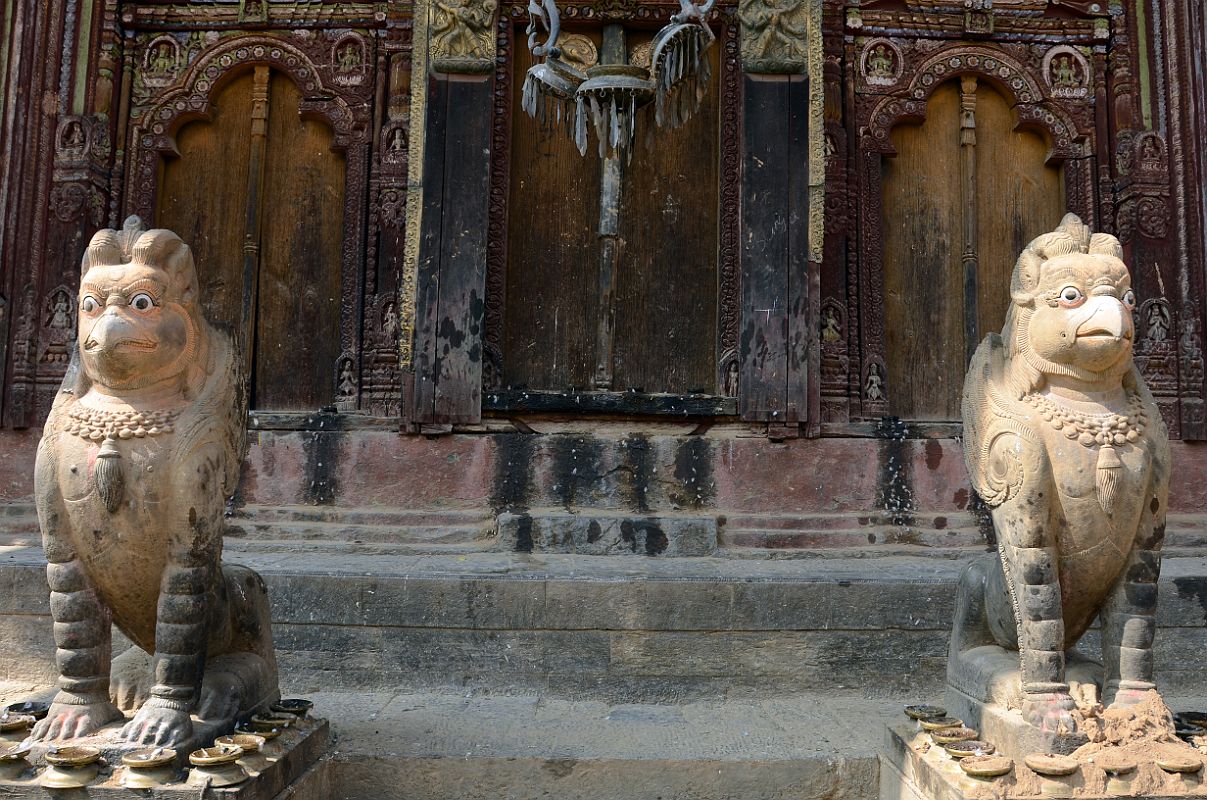 Kathmandu Changu Narayan 02 A Pair of Griffins In Front Of The East Entrance To Changu Narayan Temple A pair of griffins stands at the east entrance to the Change Narayan Temple. A griffin is a legendary creature with the body of a lion and the head and wings of an eagle.